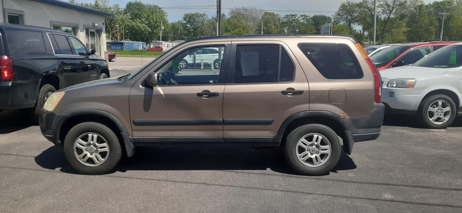 2004 Honda CR-V (JHLRD78854C) with an 2.4L L4 DOHC 16V engine, 4-Speed Automatic Overdrive transmission, located at 2015 Cambell Street, Rapid City, SD, 57701, (605) 342-8326, 44.066433, -103.191772 - CARFAX AVAILABLE - Photo#0